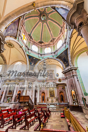 Interior of the Templo de San Diego de Alcala church, showing the altar and ceiling of one of the domes in Guanajuato City, Mexico