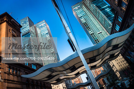 Metal canopy in front of highrise buildings in New York City, New York, USA