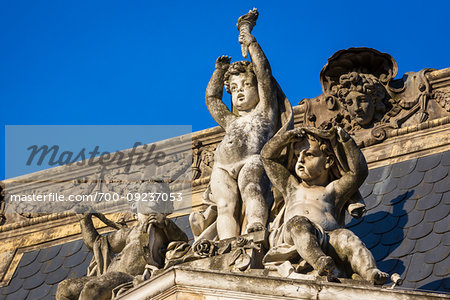 Sculptures at the top of the Foz Palace, Lisbon, Portugal.