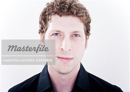 Portrait Of Man With Blond Curly Hair Stock Photo Masterfile