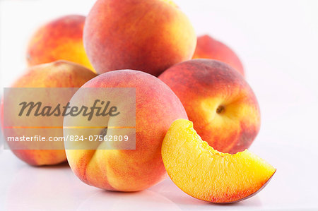 Group Of Fresh Peaches On White Background