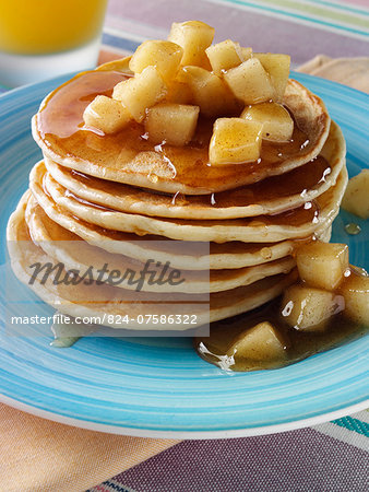 Stack of pancakes with honey