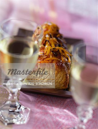 Roast pork with onions and cloves