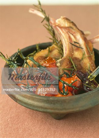 Lamb chops with rosemary,tomatoes and rosemary essential oil
