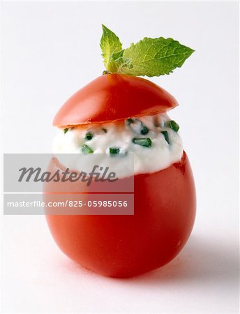 Tomato stuffed with fromage frais and herbs
