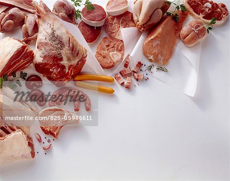 assorted cuts of raw meat assorted cuts of raw meat