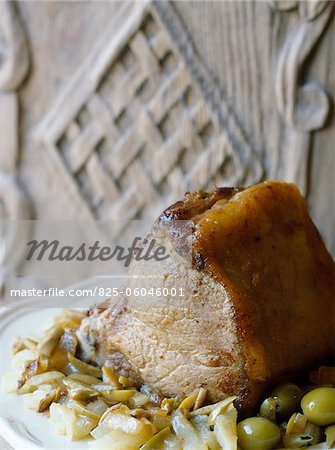 Loin of veal with beets and olives cooked in a casserole dish