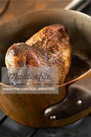 Roast guinea-fowl in a casserole dish