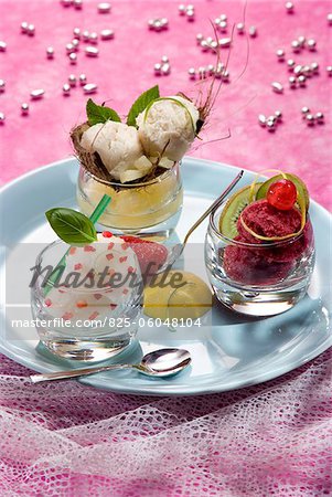 Three sorbets : basil with pieces of strawberry,all season cherry and coconut-pineapple