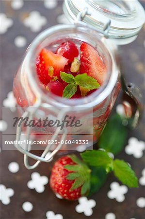 Open jar of summer fruit