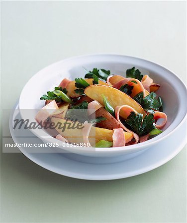 Potato,strips of boiled ham and parsley salad