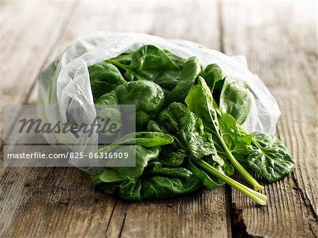 Fresh spinach leaves in a plastic bag