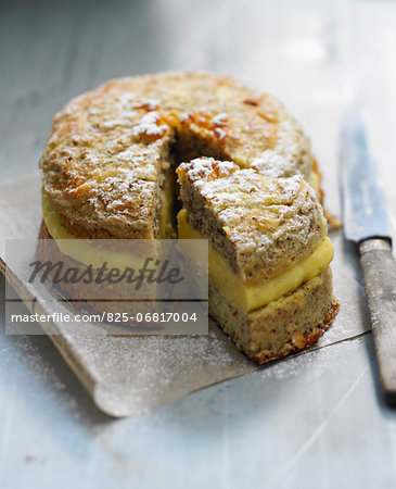 Bitter almond cake with orange cream filling