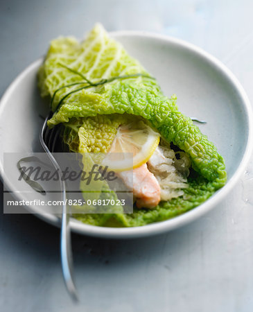 Seafood sauerkraut wrapped in a cabbage leaf