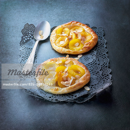Apricot and thinly sliced almond tartlets