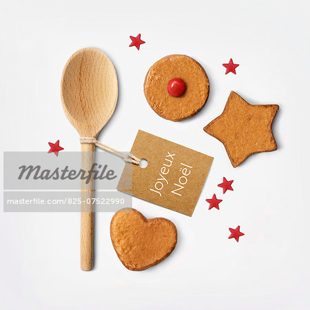 Wooden spoon and Christmas cookies