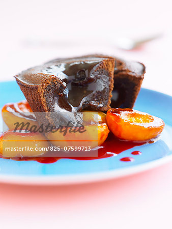 Chocolate fondant with apricots and redcurrant puree