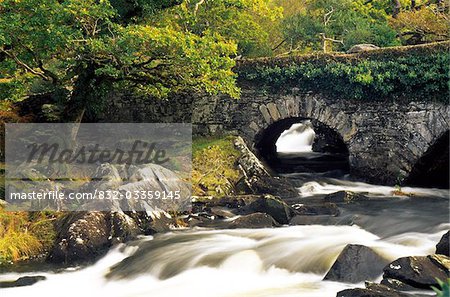 Galway's Bridge, Killarney National Park, County Kerry, Ireland; Water flowing under bridge