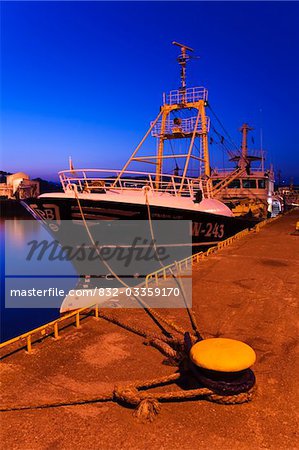 Dunmore East pier, County Waterford, Ireland; Docked fishing trawler