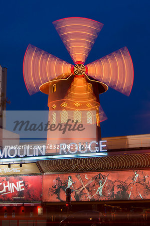 Moulin Rouge at dusk; Paris, France