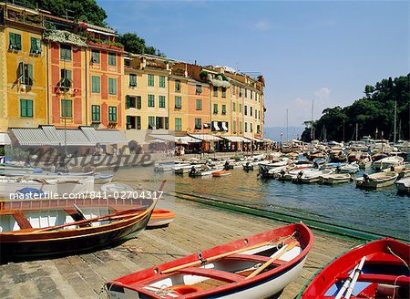 Old buildings and boats in the harbour at Portofino, Liguria, Italy