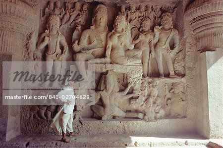 Rock cut panel depicting the Hindu God Lord Shiva and his wife Parvati, in Cave No 29, the Dhumar Lena Cave, at Ellora, Maharashtra State, India