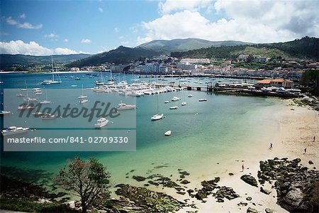 View of beach, harbour and town, Bayona, Galicia, Spain, Europe