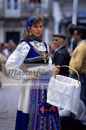 Young woman in folk dress, New Fairs, Ponte de Lima, Minho, Portugal, Europe