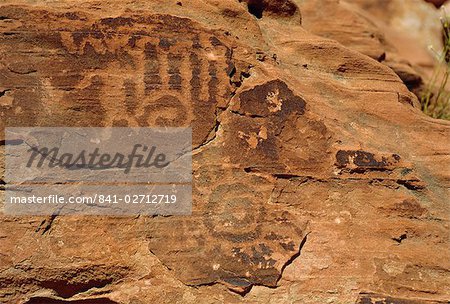Petroglyphs drawn in sandstone by Anasazi indians around 500AD, Valley of Fire State Park, Nevada, United States of America