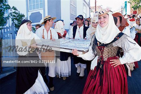 People carrying pieces of Our Lady of Snows altar, during the Descent of Our Lady of Snows fiesta, Santa Cruz de la Palma, La Palma, Canary Islands, Spain, Atlantic, Europe