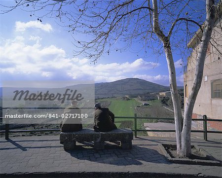 Two men on a bench, Barbagia, Sardinia, Italy, Europe