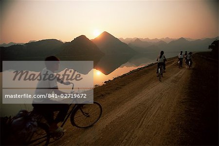 Cyclists, Cuc Phuong region, Vietnam, Indochina, Southeast Asia, Asia