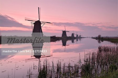 Windmills at Kinderdijk at dawn, near Rotterdam, Holland, The Netherlands