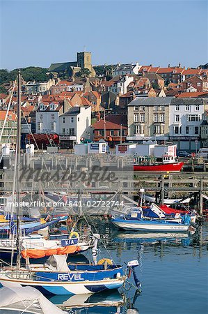 Boats in harbour and seafront, Scarborough, Yorkshire, England, United Kingdom, Europe