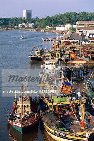 Fishing boats moored on the Terengganu River at Kuala Terengganu, capital of the state of Terengganu, Malaysia, Southeast Asia, Asia