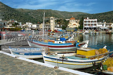 Fishing boats moored in the harbour at Elounda, near Agios Nikolas, Crete, Greece, Europe