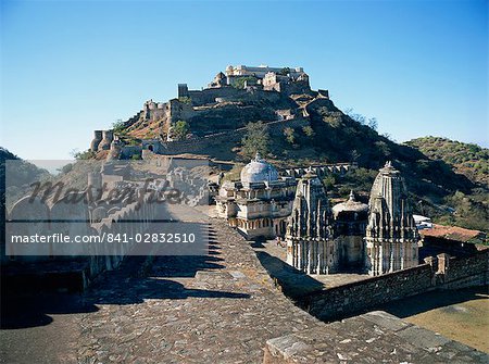 Foreground paved battlements, temples and Badal Mahal (Cloud Palace), Kumbalgarh Fort, Rajasthan state, India, Asia