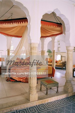 Traditional Rajput columns and cuspid arches in tented guest bedroom, Samode Palace Hotel, Samode, Rajasthan state, India, Asia