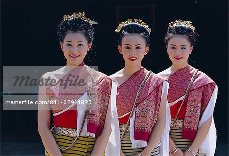 Portrait of three traditional Thai dancers, Chiang Mai, northern Thailand, Asia