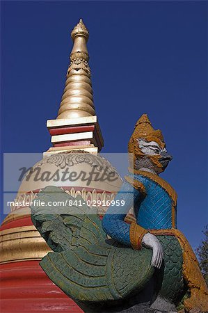 Statue and stupa, Wat In, named after the Hindu God Indra, Kengtung (Kyaing Tong), Shan state, Myanmar (Burma), Asia