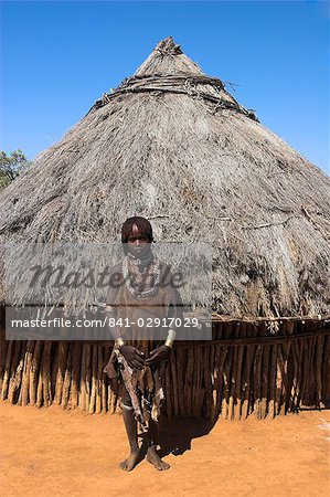 Hamer (Hamar) girl in goatskin dress, Dombo Village, Turmi, Lower Omo Valley, Ethiopia, Africa Hamer (Hamar) girl in goatskin dress, Dombo Village, Turmi, Lower Omo Valley, Ethiopia, Africa