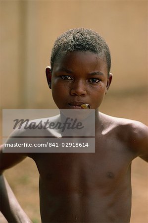 Boy with cigarette, Niamey, Niger, West Africa, Africa
