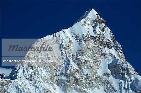 The snow covered Nuptse peak seen from Kala Patar in the Himalayas, Nepal, Asia The snow covered Nuptse peak seen from Kala Patar in the Himalayas, Nepal, Asia