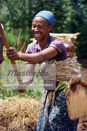 Woman With Baby On Back Working In Field Uganda Africa Stock Photo Masterfile Rights Managed Artist Robertharding Code 841