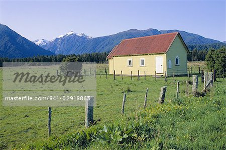 Field and colourful church at Jacobs River, South Island, New Zealand, Pacific
