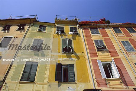 Colourful trompe l'oeuil facades by the harbour, Portofino, Portofino Peninsula, Liguria, Italy, Europe