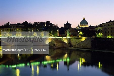 River Tiber and Ponte Vittorio Emanuele II at dusk, with St. Peter's basilica beyond, Rome, Lazio, Italy, Europe