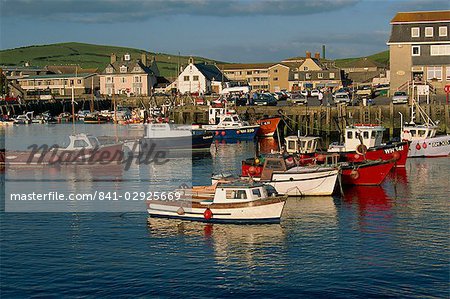 Boats moored in West Bay harbour, Dorset, England, United Kingdom, Europe