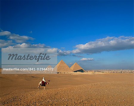 Camel rider at Giza Pyramids, Giza, UNESCO World Heritage Site, Cairo, Egypt, North Africa, Africa