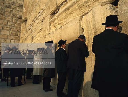 Men praying at the Western Wall, Jerusalem, Israel, Middle East